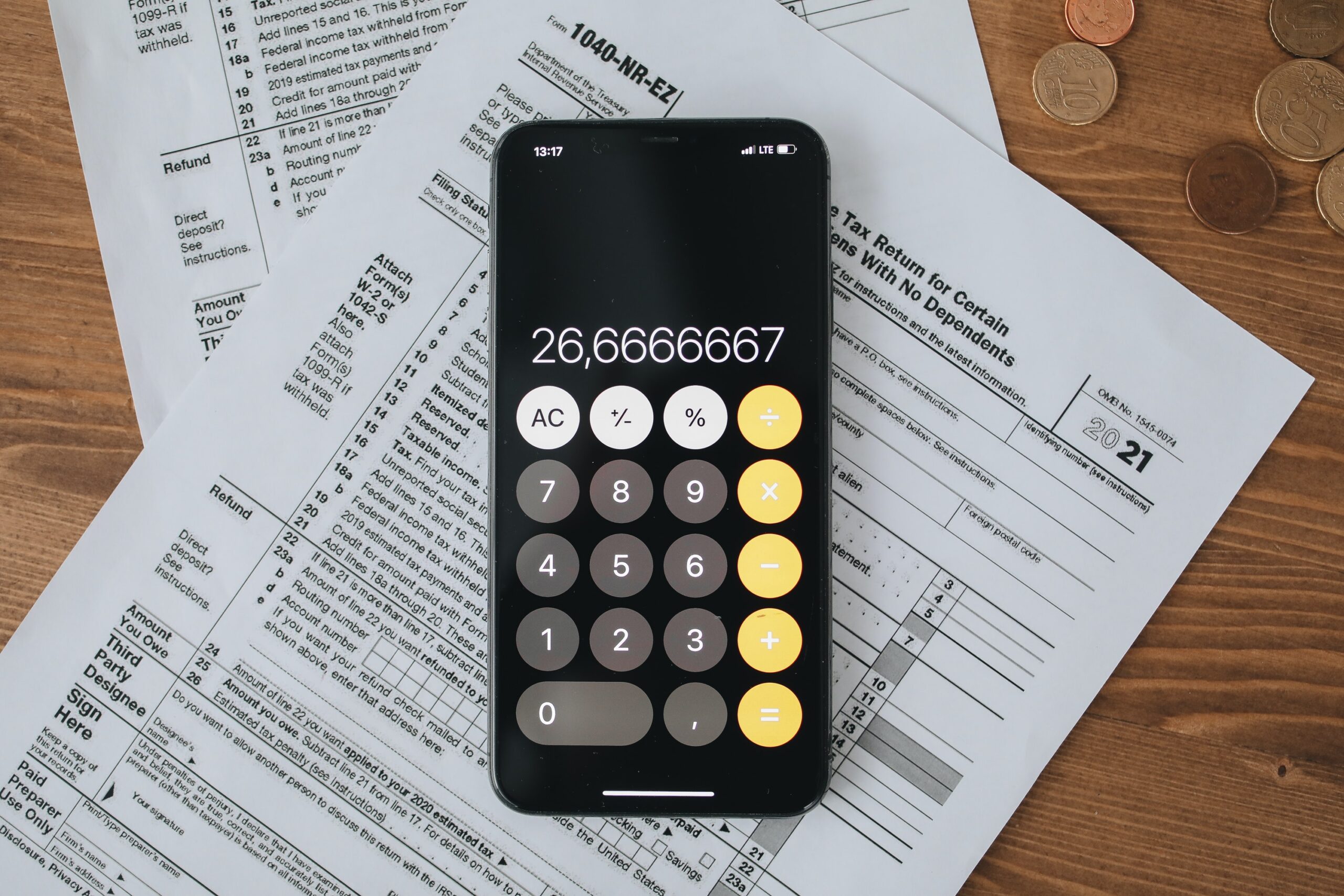 calculator on top of tax return forms
